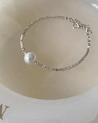 Pearls And Broken Silver