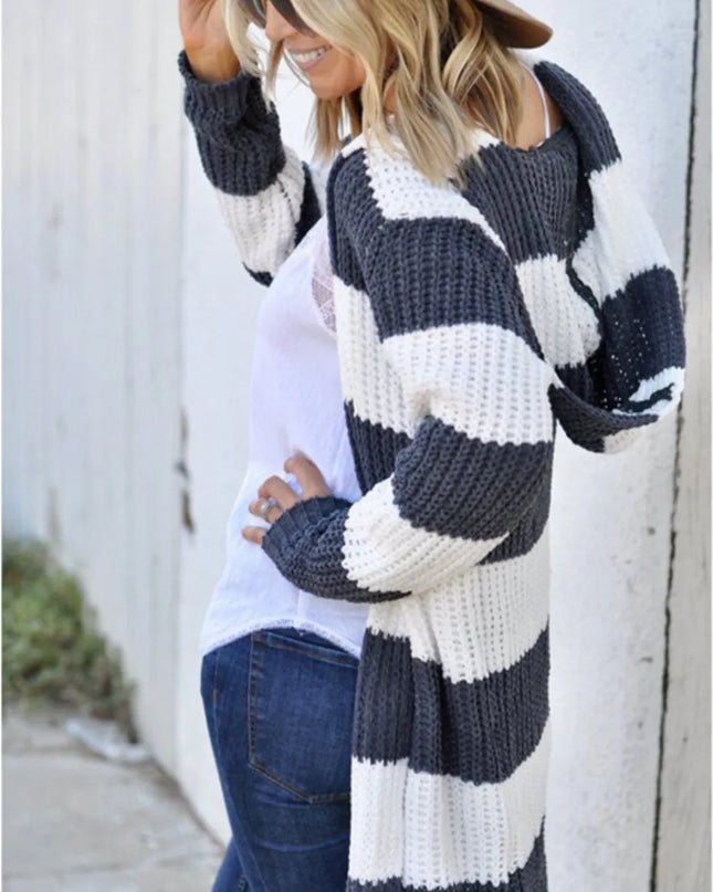 women wearing striped cardigan 