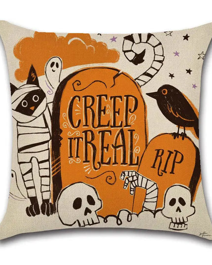 Halloween-themed decorative pillow with mummy, tombstone, and other elements.