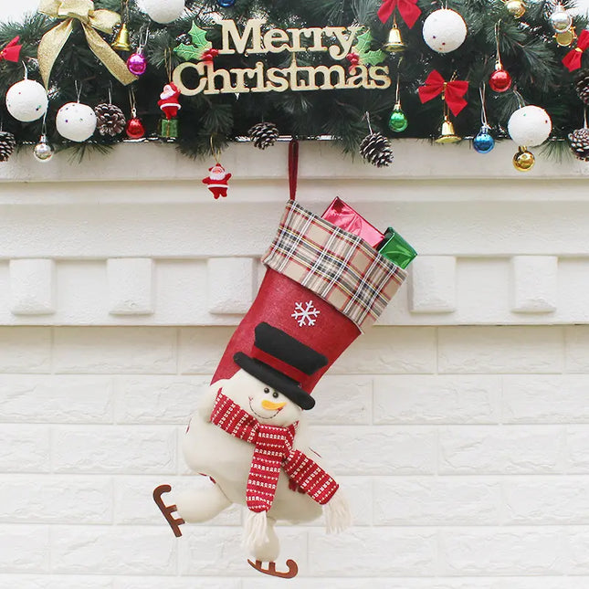 Christmas stocking with snowman design hanging on a fireplace mantle decorated with festive ornaments.