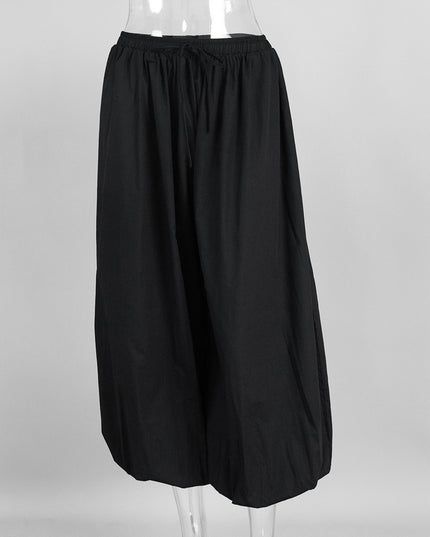 Black skirt on a mannequin against a gray background