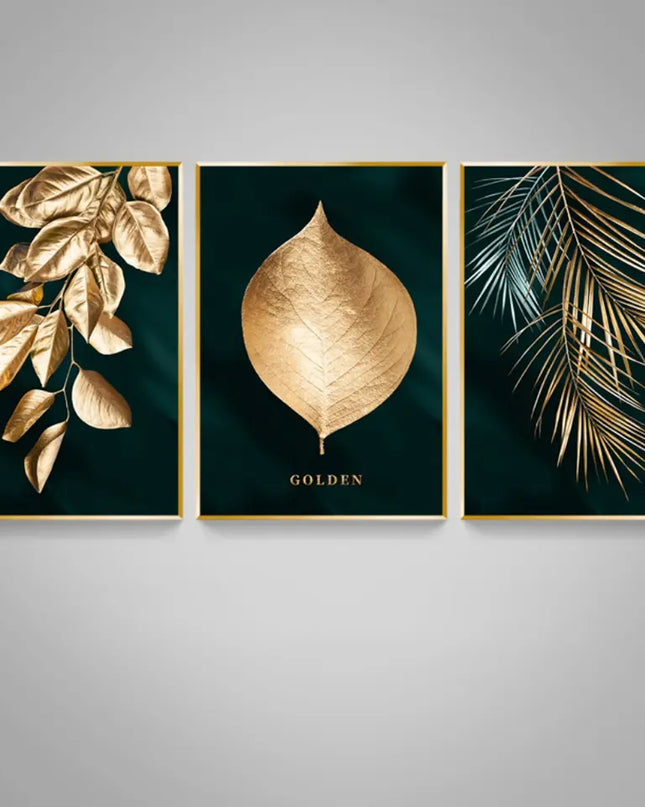 Three framed artworks with gold leaf designs on a gray background