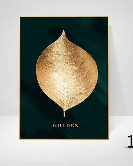 Framed artwork of a gold leaf on a dark green background with 'GOLDEN' text.