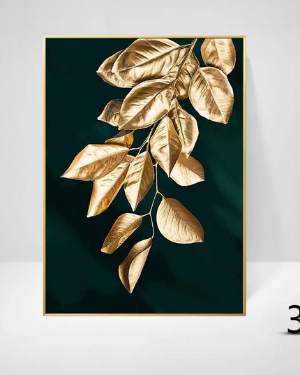 Framed artwork of gold leaves on a dark green background