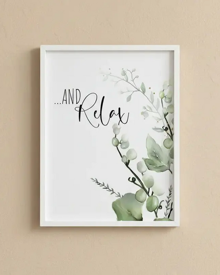 Framed artwork with greenery and 'And Relax' text on a beige wall
