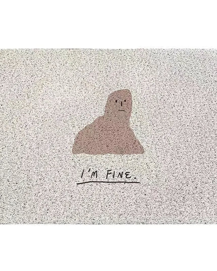 Doormat with a cartoon character and 'I'm Fine' text on a textured surface