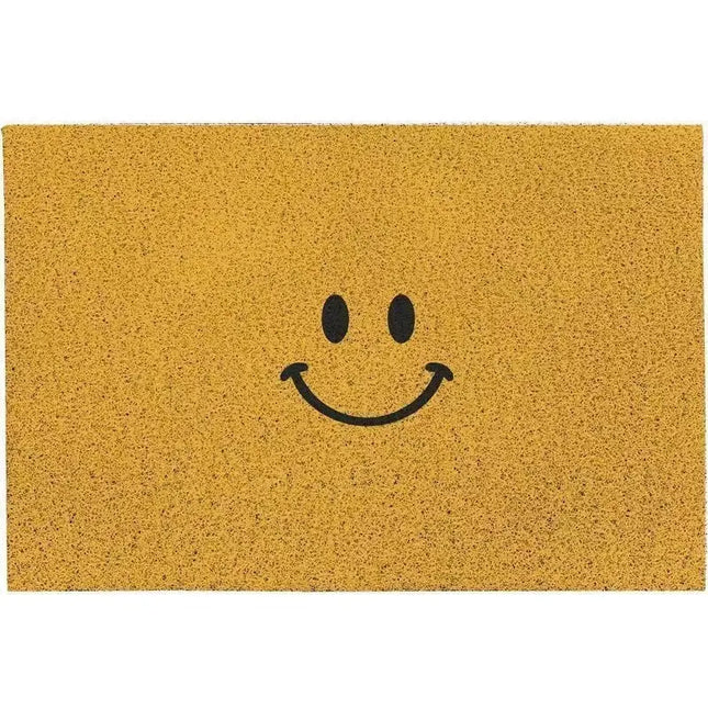 Yellow doormat with a black smiley face design on a white background