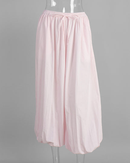 Light pink skirt on a mannequin against a gray background