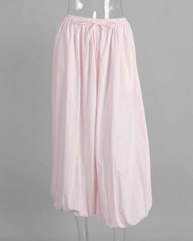 Light pink skirt on a mannequin against a gray background