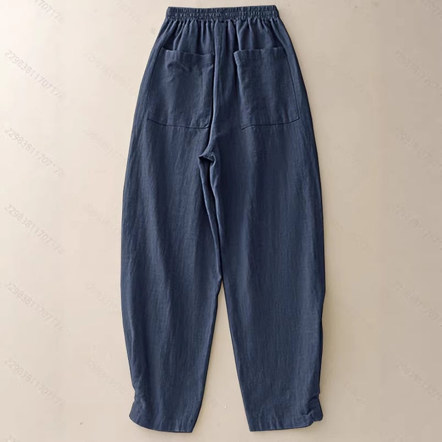 Blue pants on a beige background