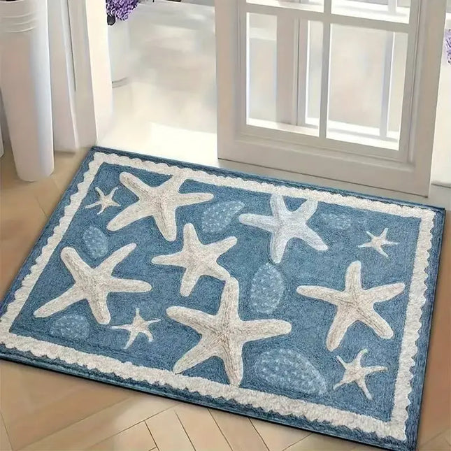 Blue rug with white starfish patterns on a wooden floor.