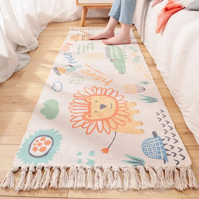 Children's rug with lion design on a wooden floor