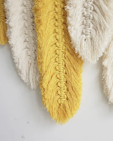 Close-up of textured yellow and beige fabric on a white background