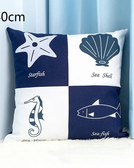 Decorative pillow with sea-themed illustrations on a blue and white checkered background