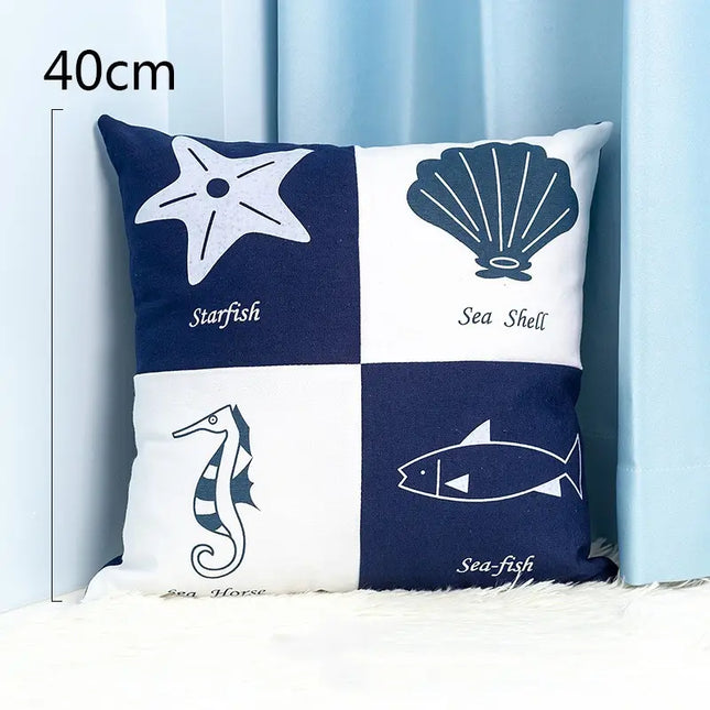 Decorative pillow with sea-themed illustrations on a blue and white checkered background