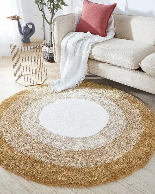 Round beige rug with concentric circles in a living room setting.