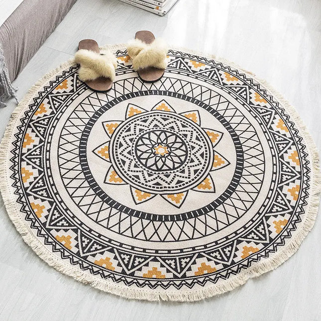 Round decorative rug with geometric pattern on a light-colored floor.