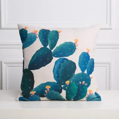 Decorative pillow with cactus pattern on a white background
