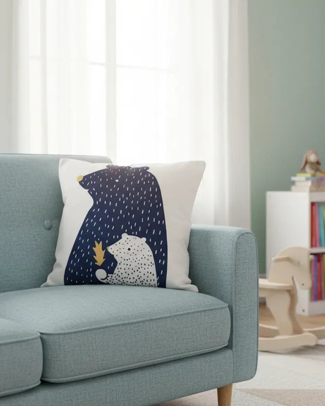 Light blue sofa with a decorative pillow featuring a bears design in a child-friendly room.