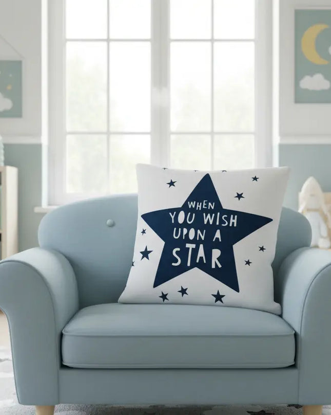 Children's room with a blue armchair, star-patterned pillow, and wall decorations.